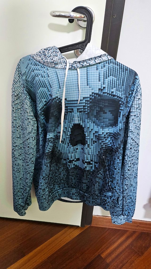 Felpa a quadri che formano un teschio