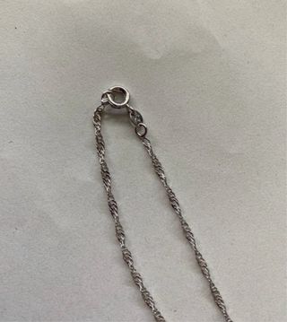 Collana con pietra viola artificiale
