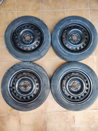Llantas de acero y tapacubos radio 14" Opel