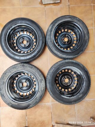 Llantas de acero y tapacubos radio 14" Opel