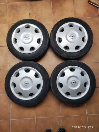 Llantas de acero y tapacubos radio 14" Opel