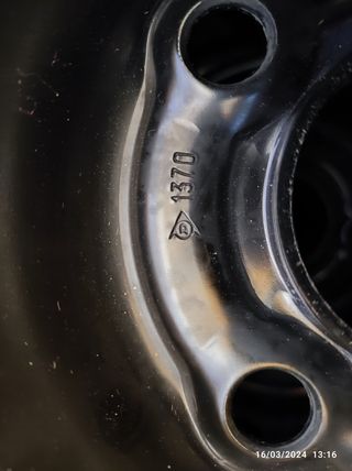 Llantas de acero y tapacubos radio 14" Opel