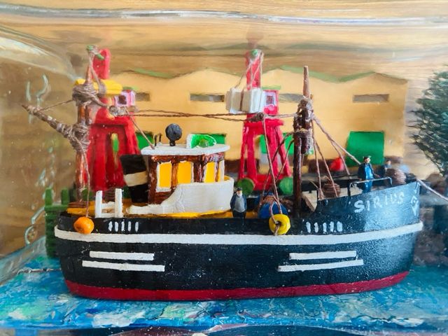 Barco TINTIN. Sirius. Dentro de botella. Con luz.