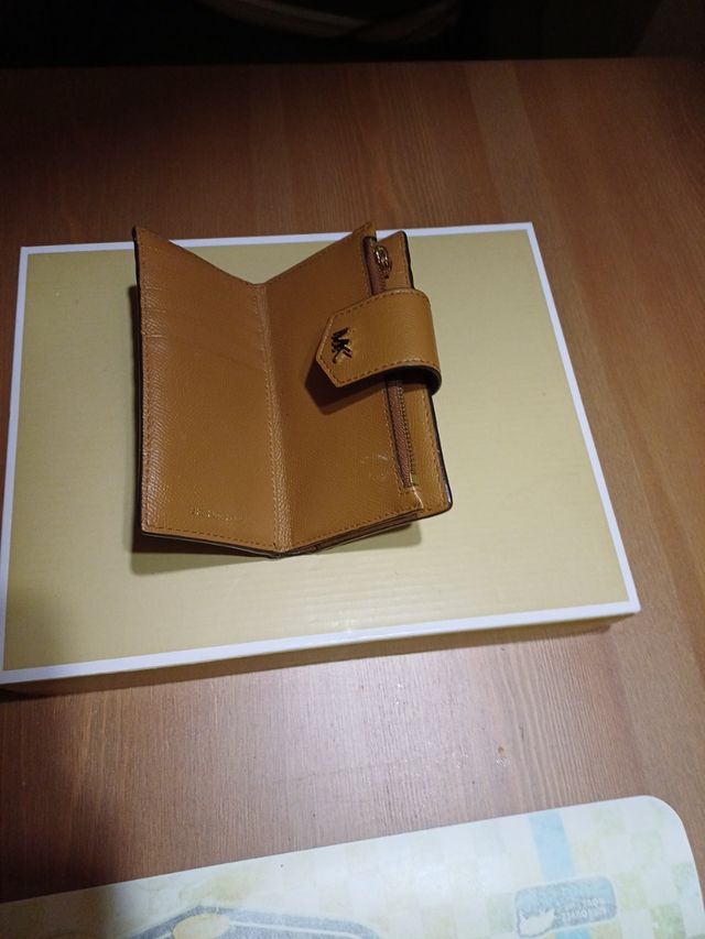 Portafoglio Michael Kors. CALO DEI PREZZI