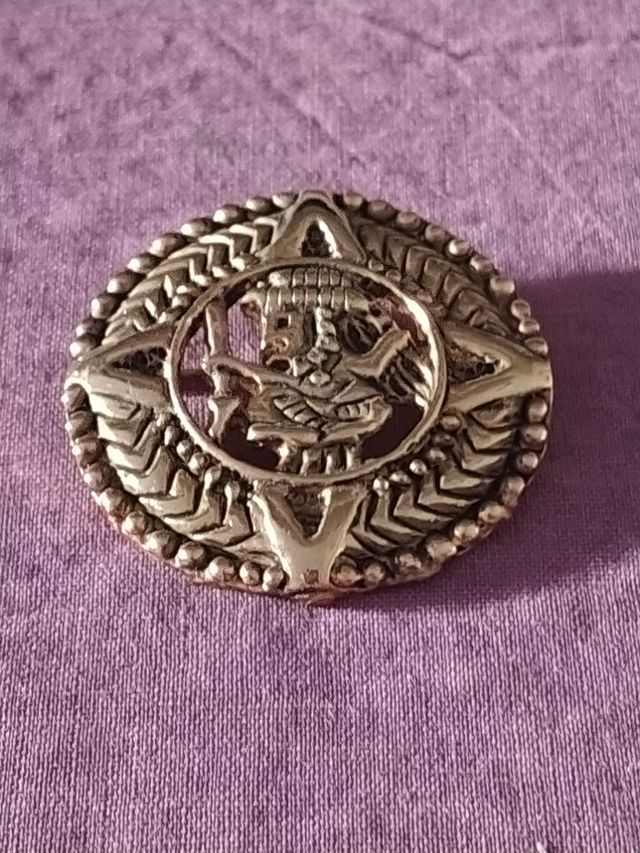 Broche étnico años 90