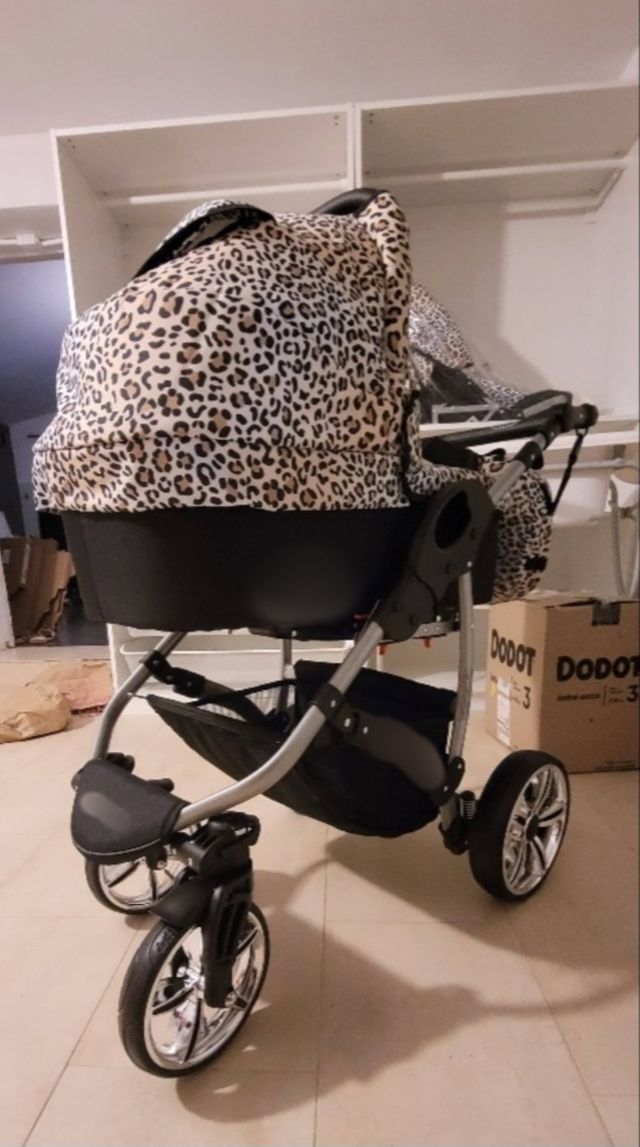 Carro de bebe leopardo DTO POR COMPRA EN MANO