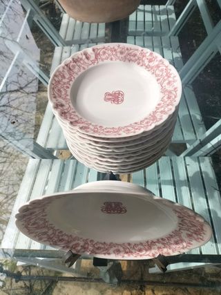 Ser de 12 platos hondos Limoges.