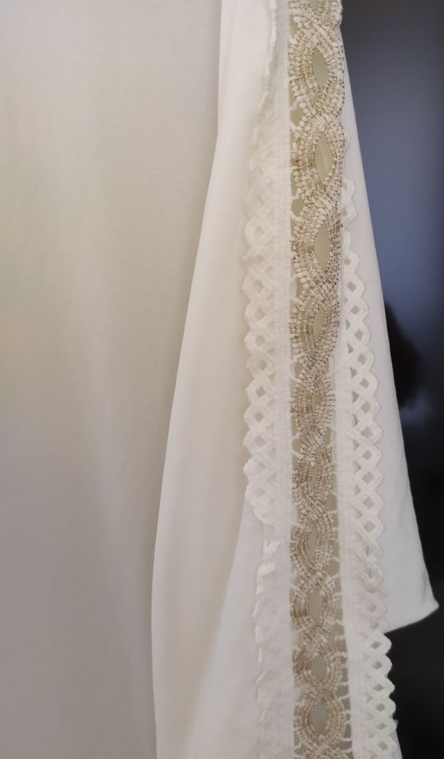 Maglia a maniche 3/4 stile pipistrello