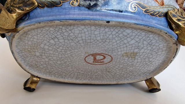 Centro de mesa en porcelana y bronce