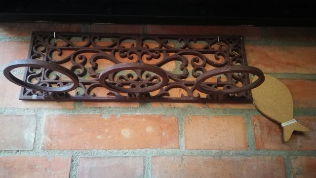 Porta macetas de hierro