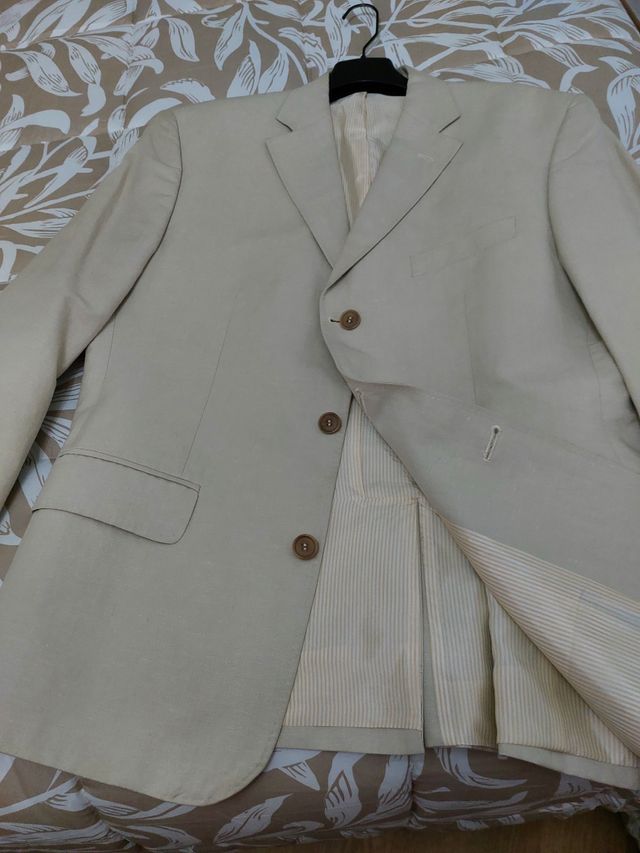 Americana. Bajo más de precio