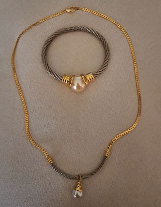 Colgante y pulsera de acero