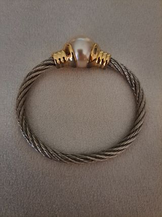 Colgante y pulsera de acero