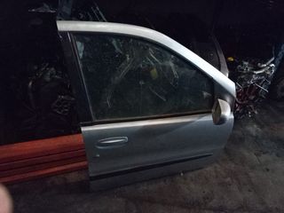 Puerta delantera derecha tata indigo 