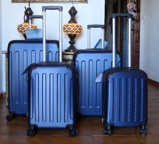 Set 4 Maletas color azul marin 8 Ruedas Giratorias