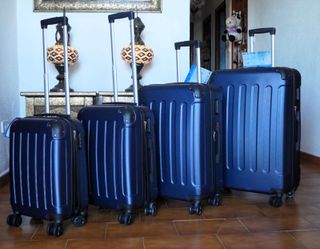 Set 4 Maletas color azul marin 8 Ruedas Giratorias