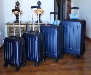 Set 4 Maletas color azul marin 8 Ruedas Giratorias