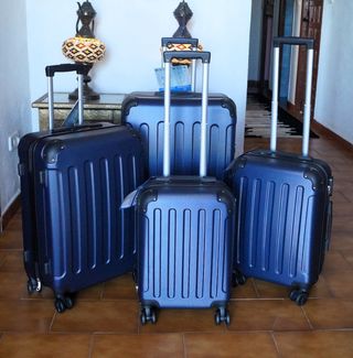 Set 4 Maletas color azul marin 8 Ruedas Giratorias