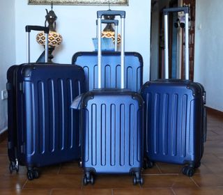 Set 4 Maletas color azul marin 8 Ruedas Giratorias