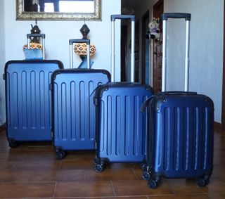 Set 4 Maletas color azul marin 8 Ruedas Giratorias