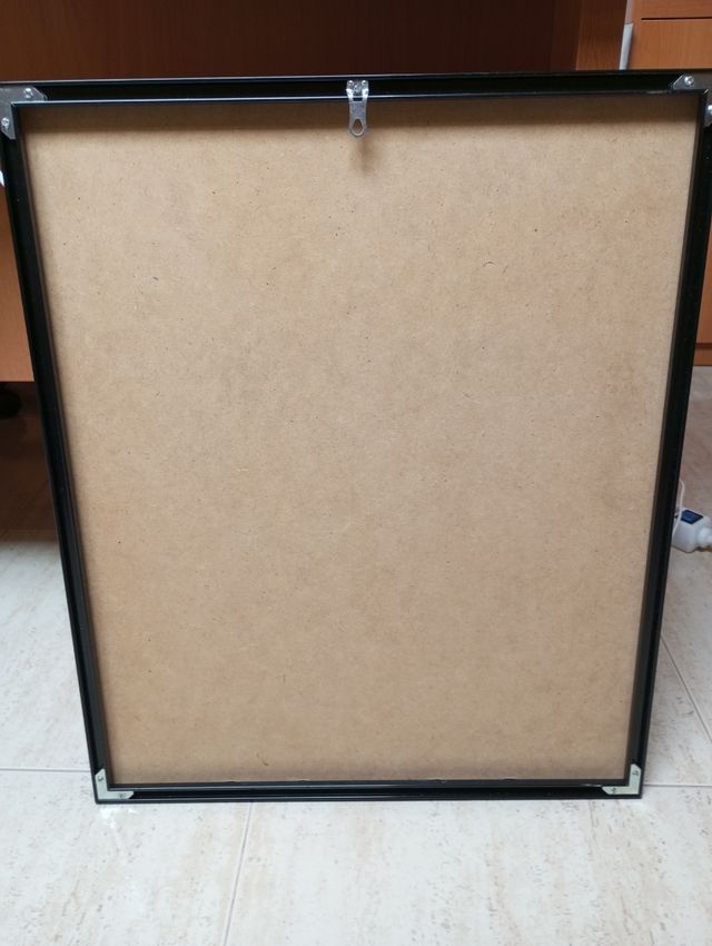 Óleo enmarcado puerta