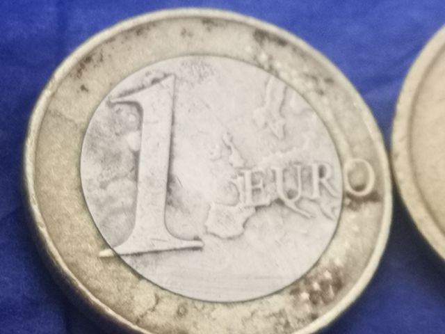 Moneda con defecto  escucho ofertas