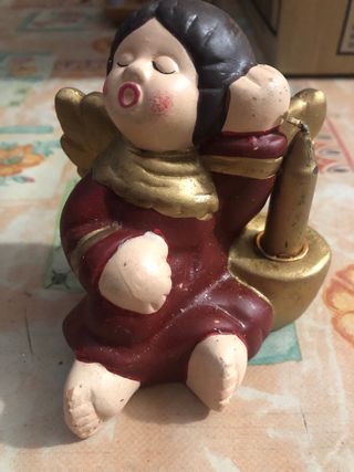 Angelo con candela