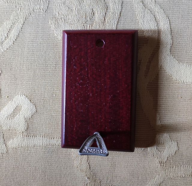 Miniatura in argento e legno