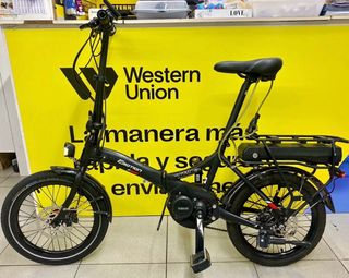 Vendo bicicleta electrica de paseo plegable .