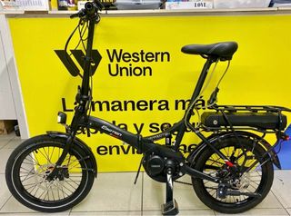 Vendo bicicleta electrica de paseo plegable .