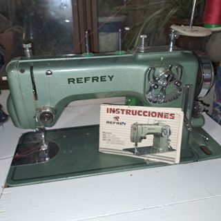 Maquina owerlock singer