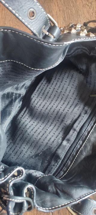 Bolso negro de tachas de purificación