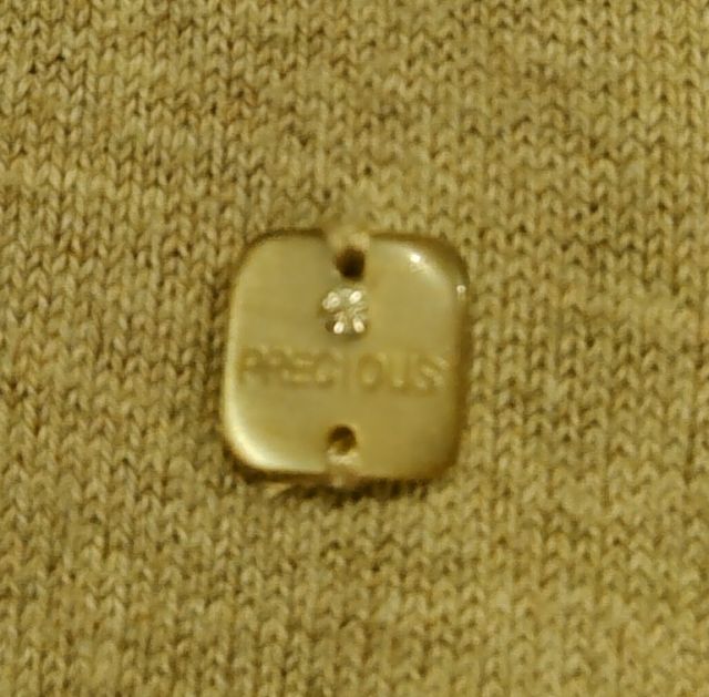 Cardigan beige con bottoni