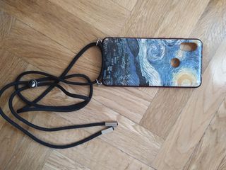 Funda teléfono móvil y colgante