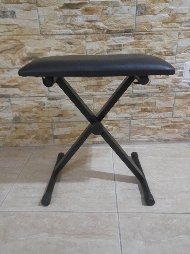 Taburete pleglable poli piel