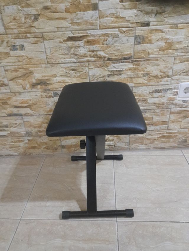 Taburete pleglable poli piel