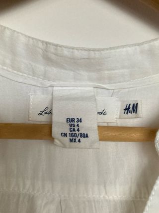 Blusa blanca sin mangas, H&M