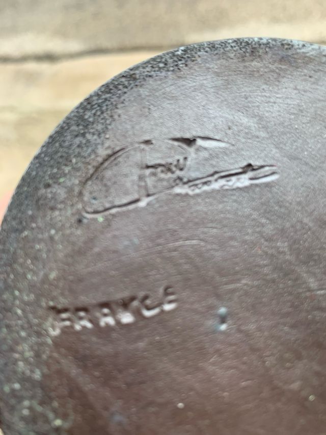 bottiglia in grees porcellanato , artista francese