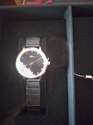 Reloj de mujer y pulsera los dos