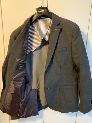 Giacca grigia con toppe