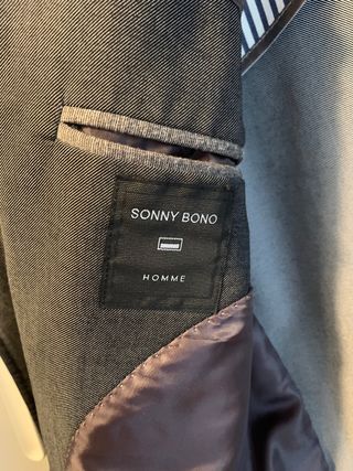 Giacca grigia con toppe