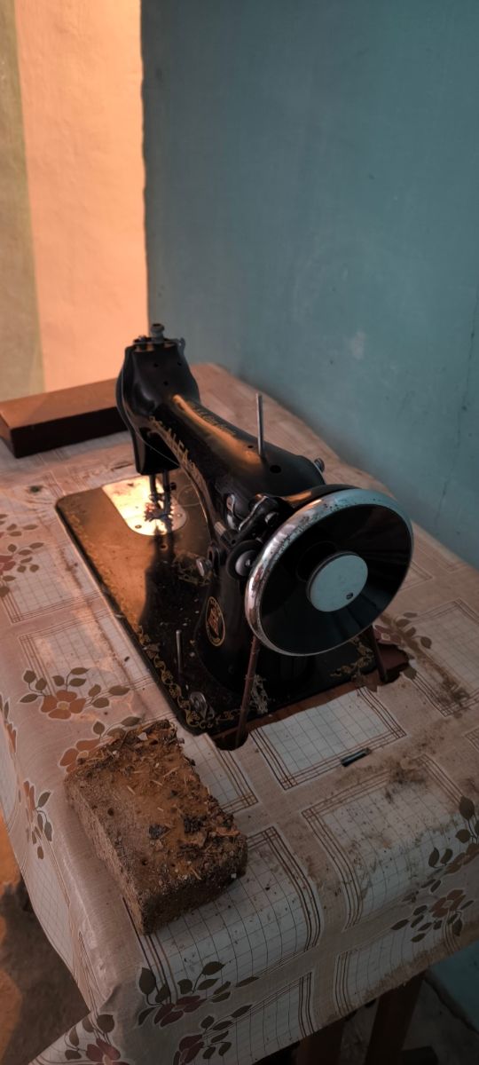 Antigua maquina de coser alfa