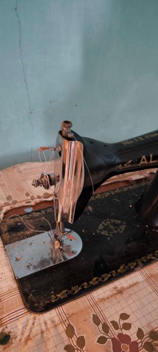 Antigua maquina de coser alfa