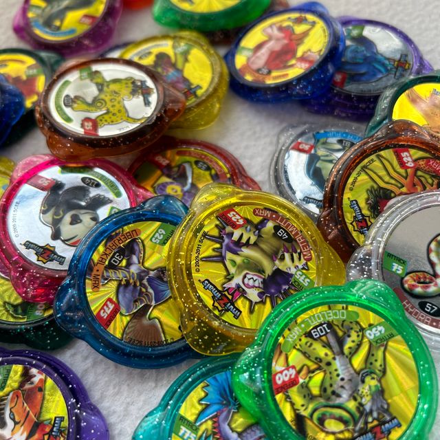 Lote de 20 kraks / tazos de Invizimals