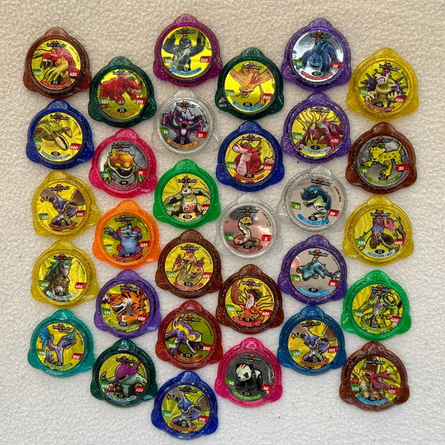 Lote de 20 kraks / tazos de Invizimals