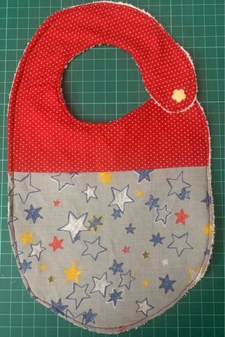 Baberos cosidos a mano