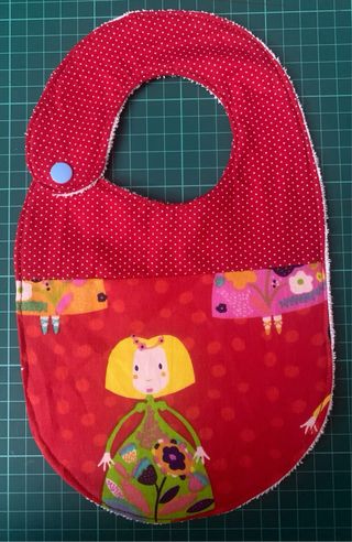 Baberos cosidos a mano