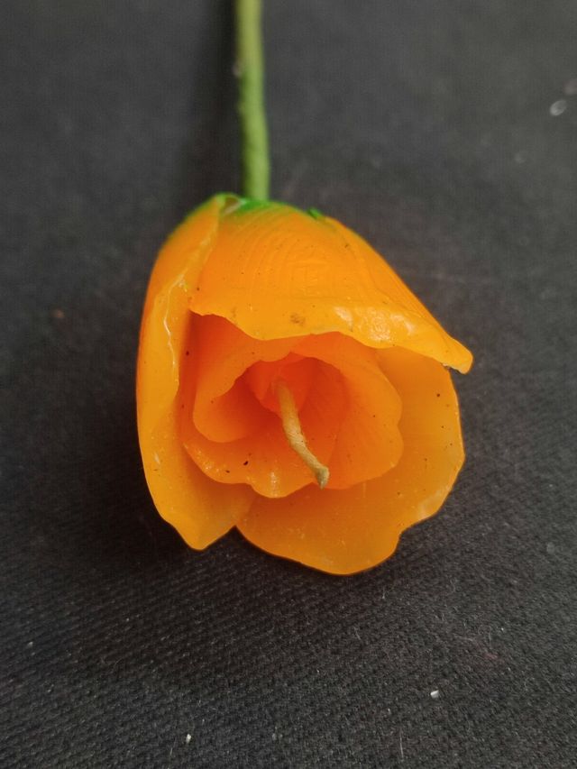 Vela forma rosa decoración