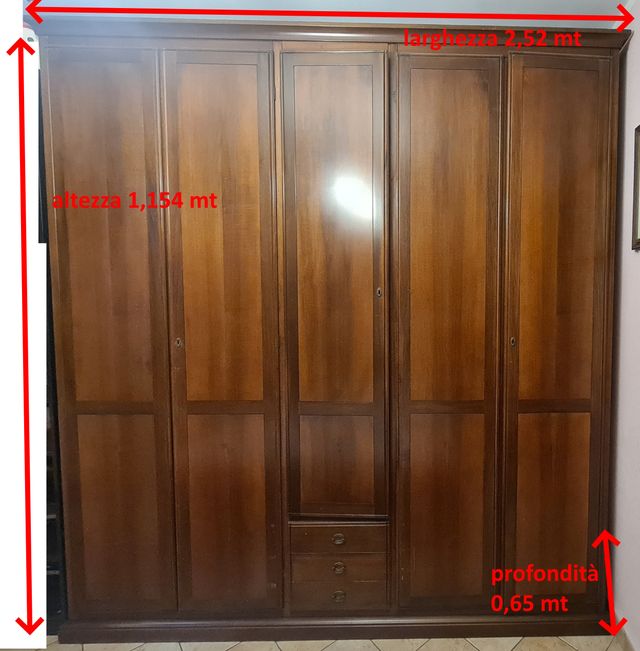 camera matrimoniale in noce, libreria,nascondiglio