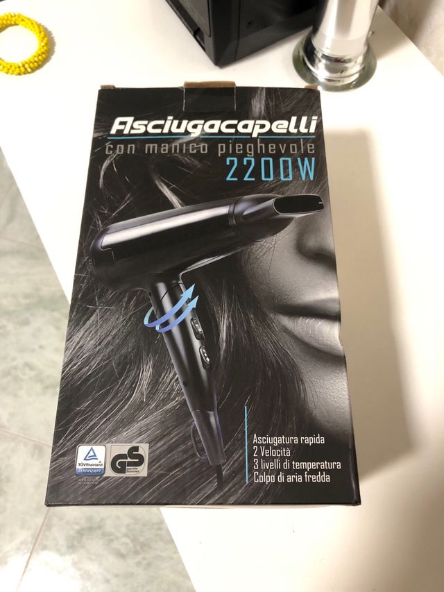 Asciugacapelli con manico pieghevole